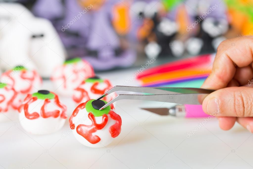 Confectioner with figures of halloween