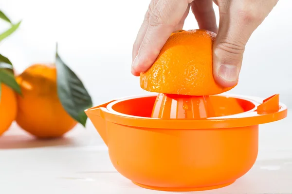 Orange juice squeezing — Stock Photo, Image