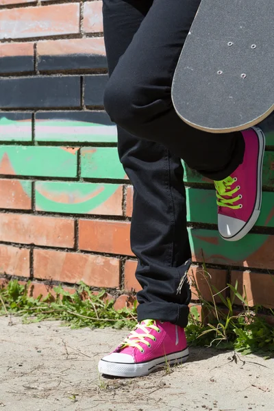 Girl with a skateboard — Stock Photo, Image