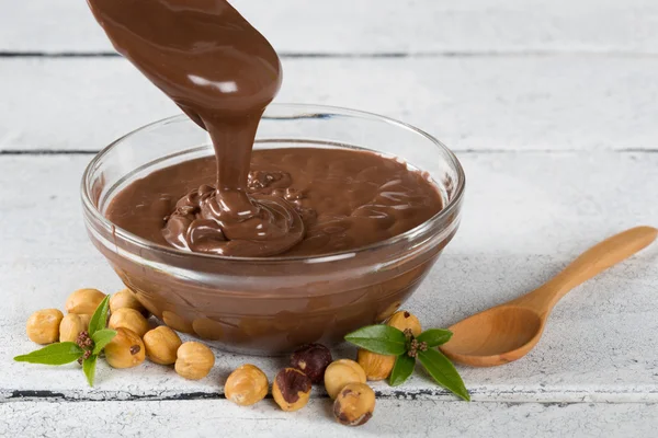 Hazelnut cream with hazelnut nuts — Stock Photo, Image