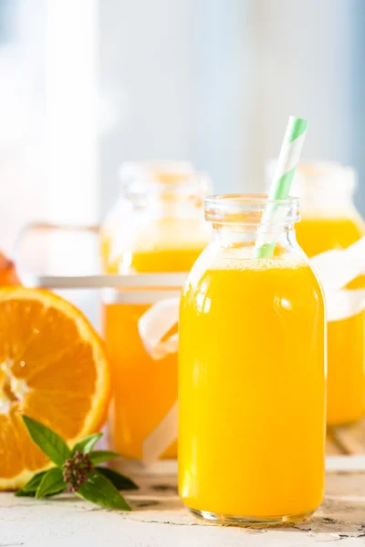 Orange juice bottle — Stock Photo, Image