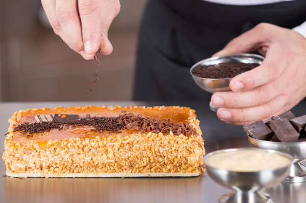 Pastry chef decorating