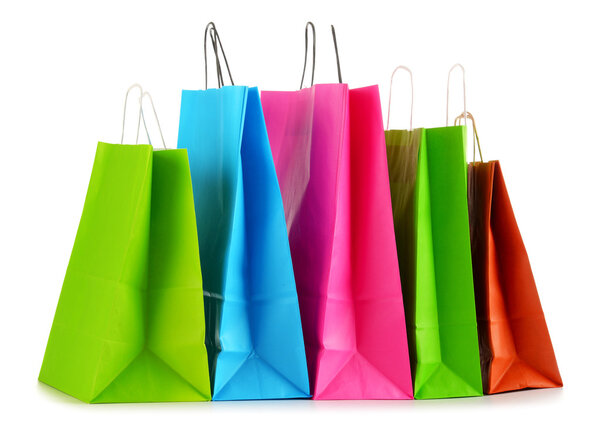 Colorful paper shopping bags isolated on white