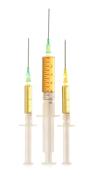 白で隔離される 3 つの注射器 — ストック写真