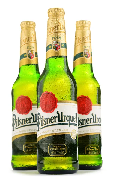 Bottles of Pilsner Urquell beer over white — Stok fotoğraf