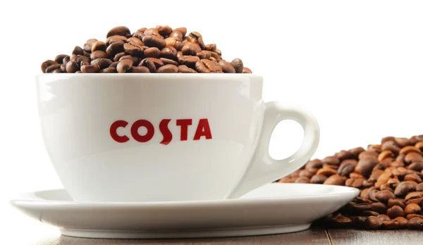 Kompozycja z Pucharu Costa Coffee kawa i fasoli — Zdjęcie stockowe
