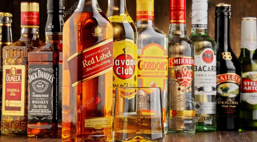 Bottles of assorted hard liquor brands Stock Editorial Photo