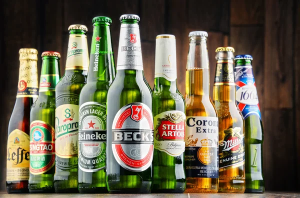 Bottles of assorted global beer brands — Stock Photo, Image