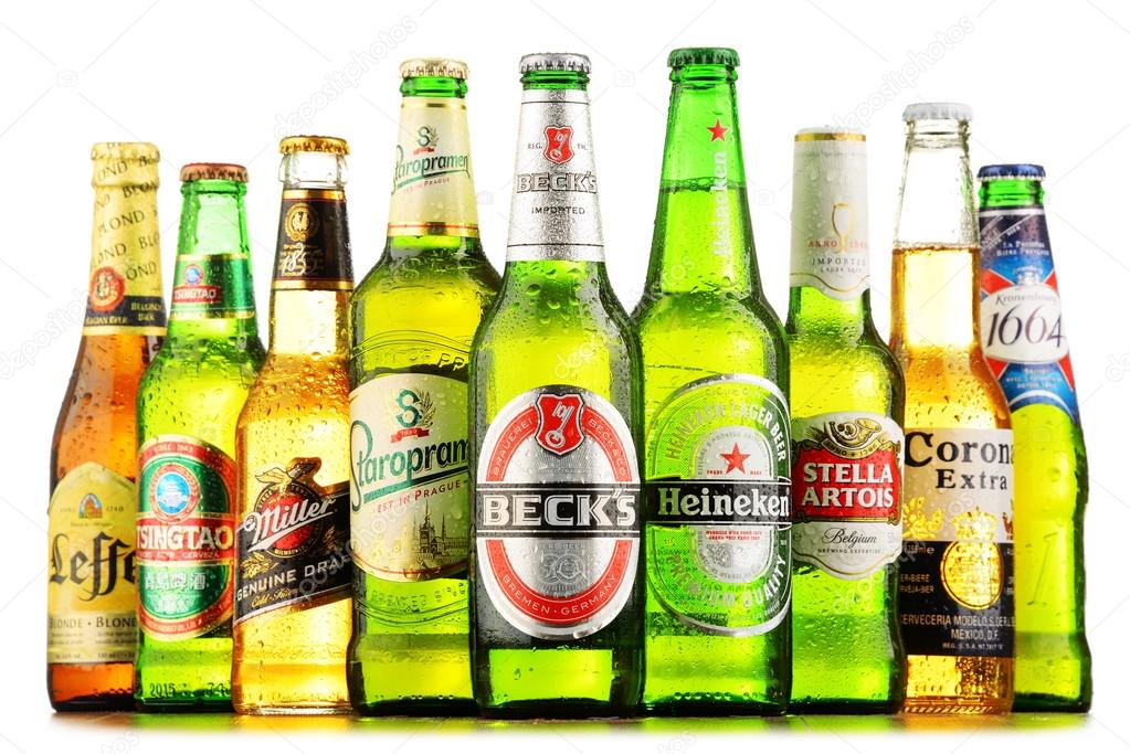 Bottles of assorted global beer brands Stock Editorial Photo
