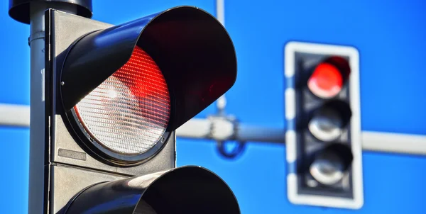 Traffic lights over blue sky — Stock Photo, Image