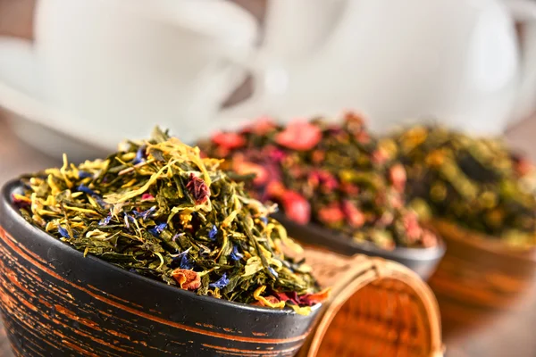 Composition with bowls of tea leaves — Stock Photo, Image