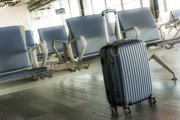 Small Plastic Travel Suitcase Airport Hall — Stock Photo, Image