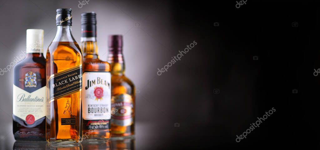 POZNAN, POL - MAY 12, 2021: Bottles of popular global whiskey brands