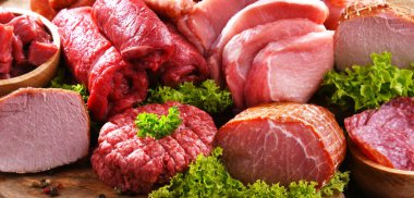 Composition with assorted meat products clipart