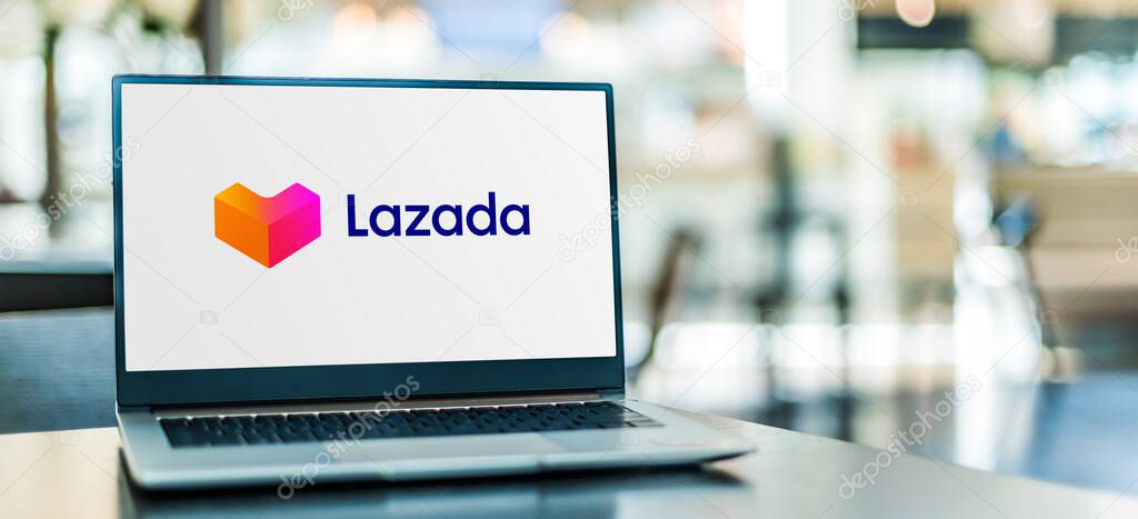 POZNAN, POL - SEP 23, 2020: Laptop computer displaying logo of Lazada, an international e-commerce company founded in 2012 and owned by Alibaba Group.