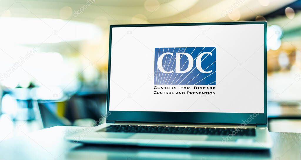 POZNAN, POL - APR 15, 2021: Laptop computer displaying logo of The United States Centers for Disease Control and Prevention, the national public health agency of the USA