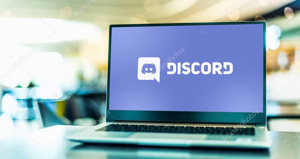 POZNAN, POL - APR 15, 2021: Laptop computer displaying logo of Discord, a VoIP, instant messaging and digital distribution platform designed for creating communities