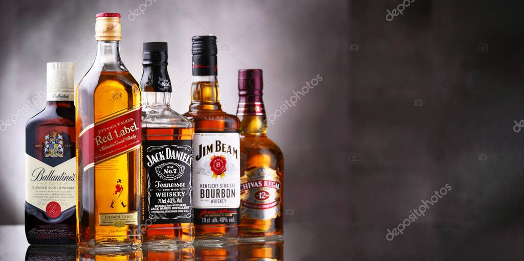 POZNAN, POL - MAY 12, 2021: Bottles of popular global whiskey brands