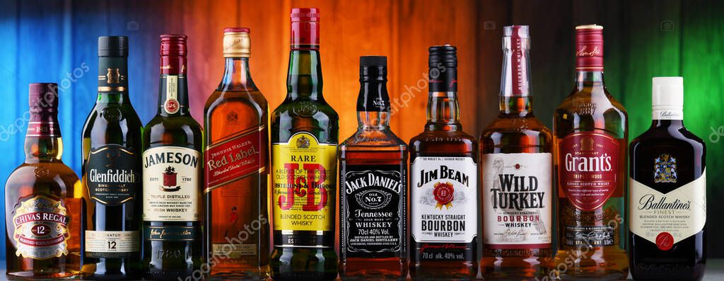 POZNAN, POL - AUG 05, 2021: Bottles of popular global whiskey brands