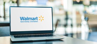 POZNAN, POL - 6 Ocak 2021: Merkezi Bentonville, Arkansas 'ta bulunan çok uluslu bir perakende satış şirketi olan Walmart Inc.' in logosunu gösteren dizüstü bilgisayar