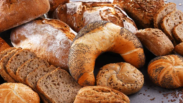 Assorted Bakery Products Including Loafs Bread Rolls — Stock Photo, Image