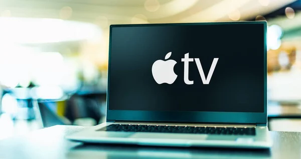 stock image POZNAN, POL - FEB 6, 2021: Laptop computer displaying logo of Apple TV, a digital media player and microconsole developed and sold by Apple Inc