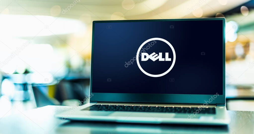 POZNAN, POL - FEB 6, 2021: Laptop computer displaying logo of Dell, an American multinational computer technology company that develops, sells, repairs, and supports computers and related products and services