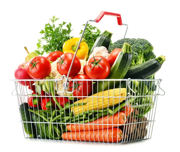 Wire shopping basket with groceries isolated on white — Stock Photo, Image