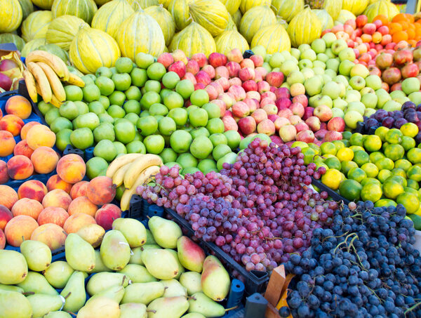 Variety of fresh organic fruits on the street stall