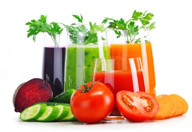 Glasses with fresh vegetable juices isolated on white clipart