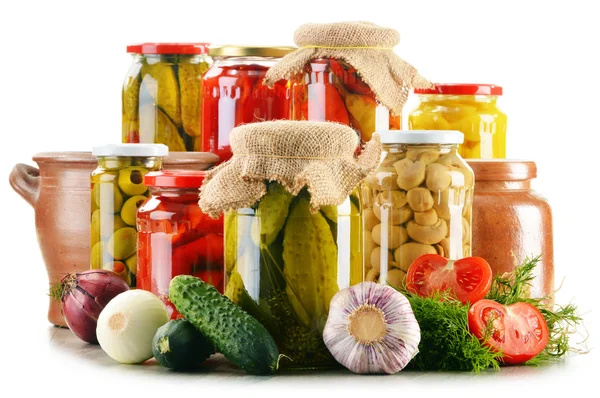Composition with jars of pickled vegetables. Marinated food — Stock Image Composition with jars of pickled vegetables. Marinated food Stock Image