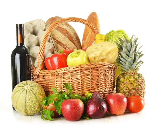 Groceries in wicker basket isolated on white — Stock Photo, Image