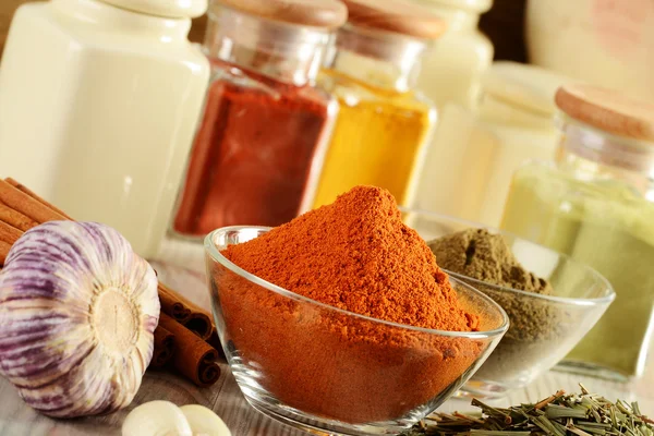 Variety of spices on kitchen table — Stock Photo, Image