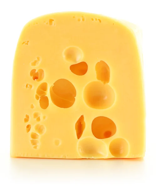 Composizione con pezzo di formaggio isolato su bianco — Foto Stock