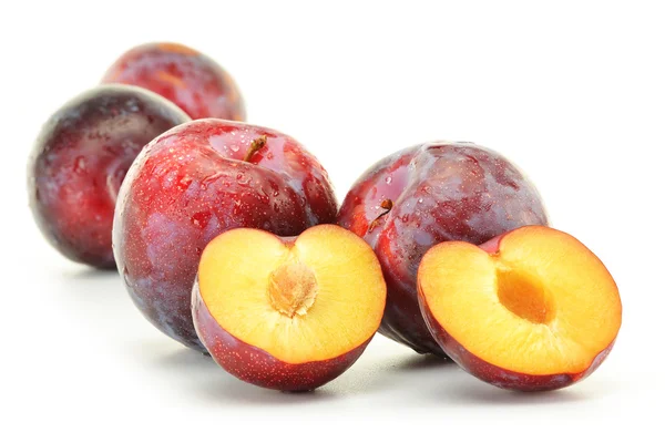 Composition with plums on white background — Stock Photo, Image