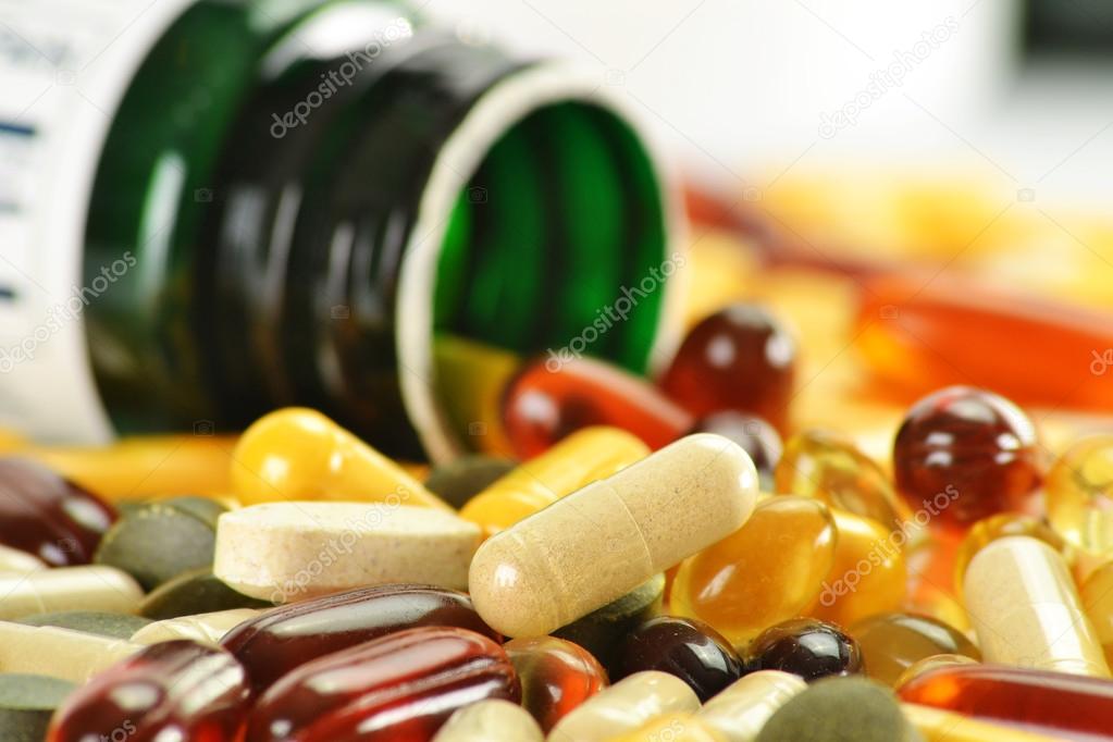 Composition with dietary supplement capsules and containers