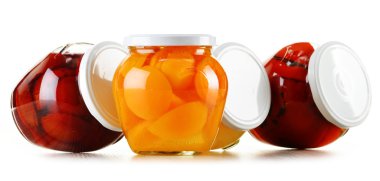 Jars with fruity compotes isolated on white. Preserved fruits clipart
