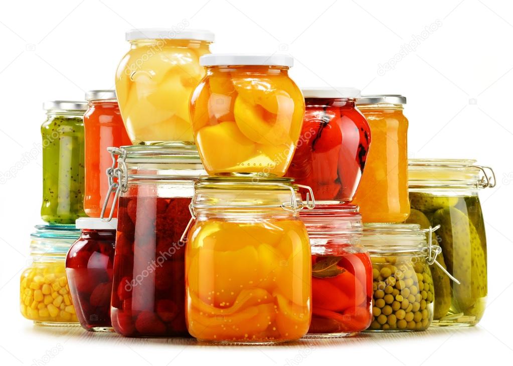 Jars with pickled vegetables, fruity compotes and jams isolated 