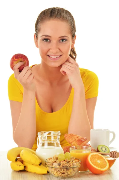 Een jonge vrouw die ontbijt. Evenwichtige voeding — Stockfoto