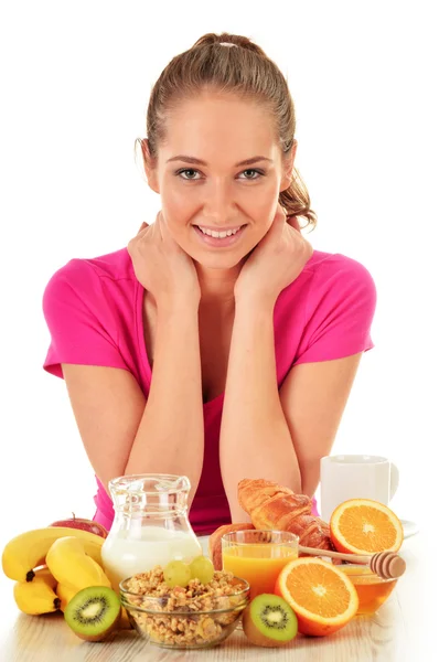 Een jonge vrouw die ontbijt. Evenwichtige voeding — Stockfoto