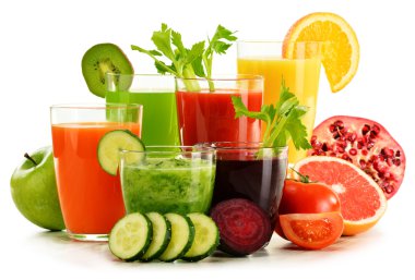 Glasses with fresh organic vegetable and fruit juices on white clipart