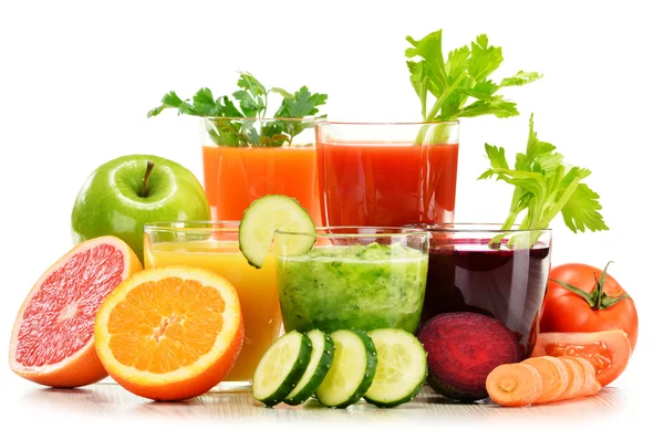 Glasses with fresh organic vegetable and fruit juices on white — Stock Photo, Image