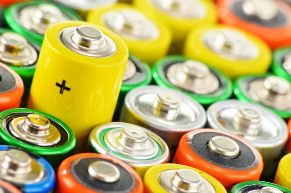 Composition with alkaline batteries. Chemical waste — Stock Photo, Image