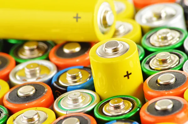 Composition with alkaline batteries. Chemical waste — Stock Photo, Image