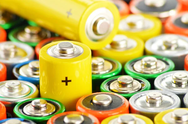 Composition with alkaline batteries. Chemical waste — Stock Photo, Image