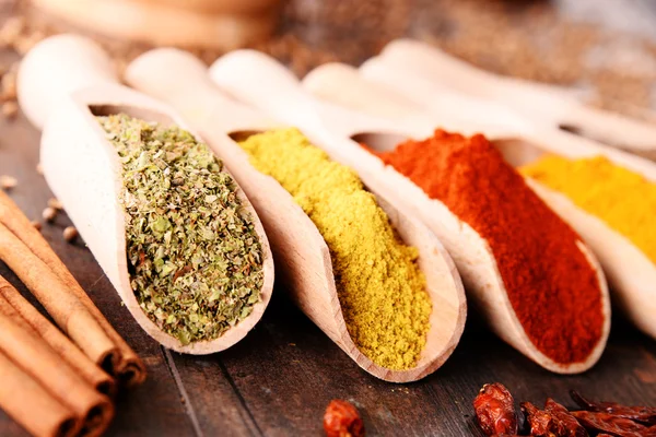 Variety of spices on kitchen table — Stock Photo, Image