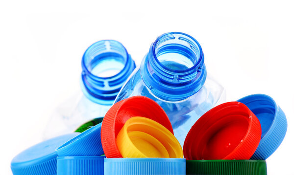 Composition with plastic bottles and caps