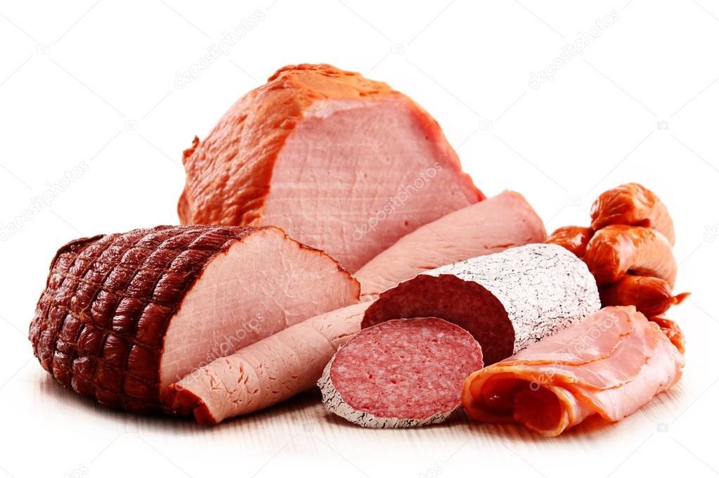 Meat products including ham and sausages isolated on white