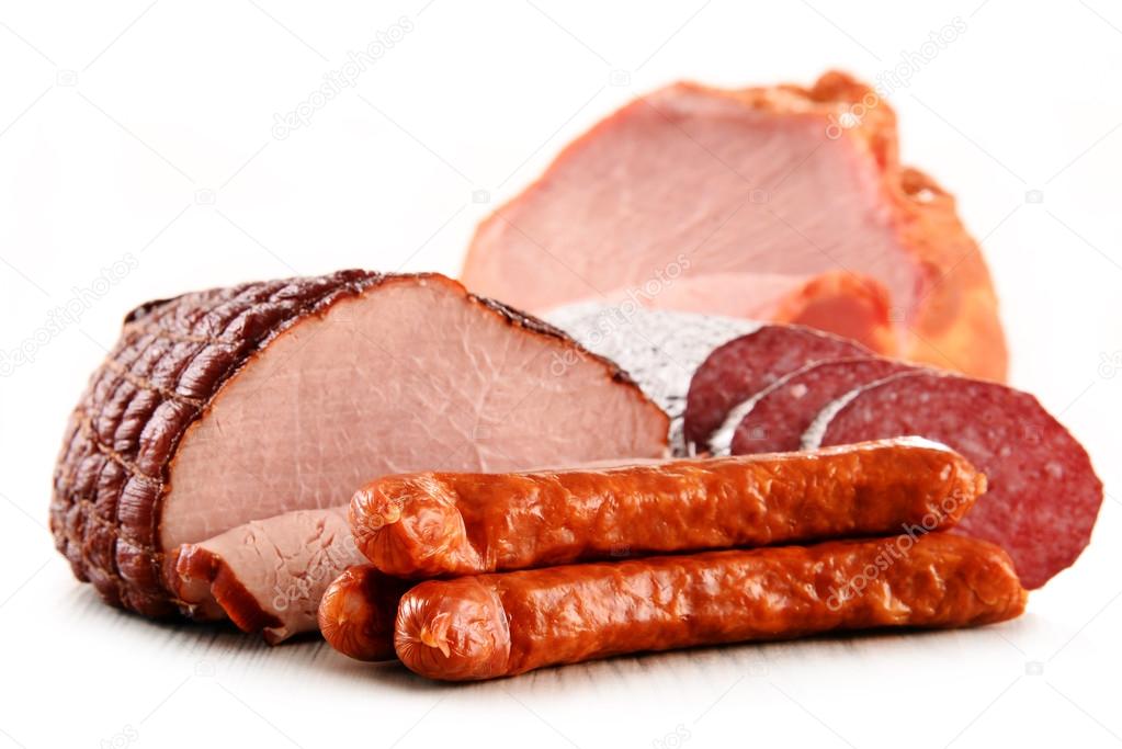 Meat products including ham and sausages isolated on white