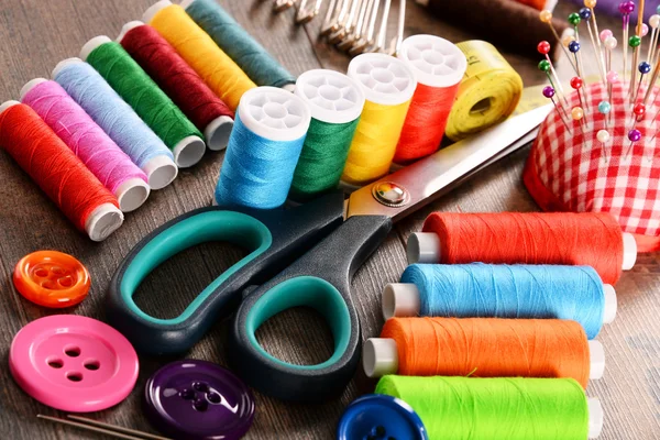 Composition with tailor accessories on wooden table — Stock Photo, Image